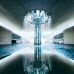 Stunning vertical shot of the iconic fountain at the National Museum, reflecting architectural elegance.